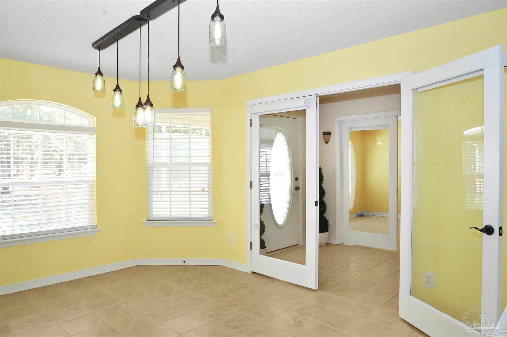 4454 Lyons Place Holt, FL 32564 - Photo 19 of 53 a view of a bathroom with a shower