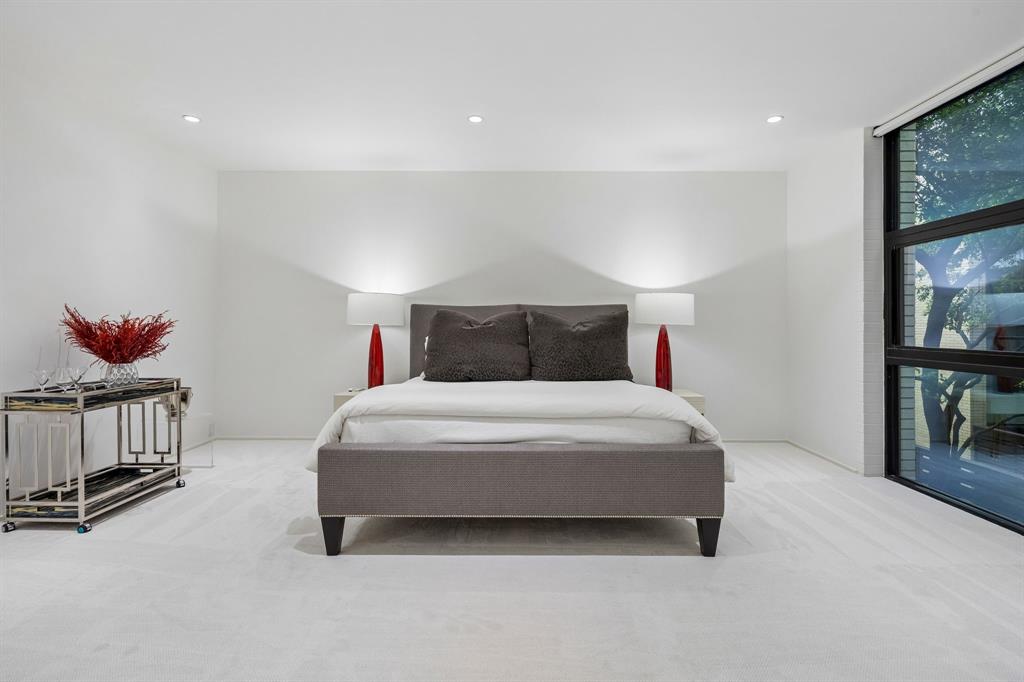 4321 Travis Street Dallas, TX 75205 - Photo 17 of 40 a bedroom with a bed and window