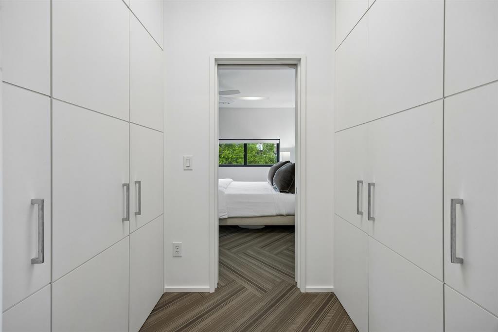 4321 Travis Street Dallas, TX 75205 - Photo 28 of 40 a bedroom with a bed and a window