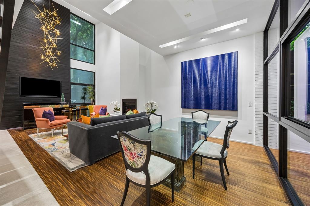 4321 Travis Street Dallas, TX 75205 - Photo 5 of 40 a living room with furniture and a flat screen tv