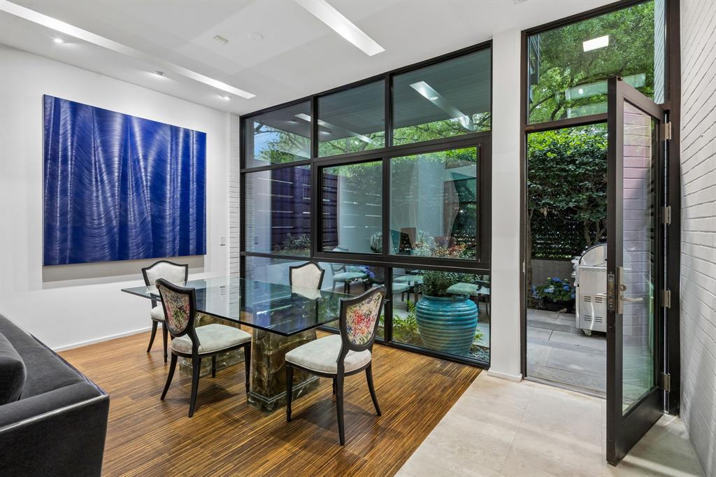 4321 Travis Street Dallas, TX 75205 - Photo 9 of 40 a dining room with furniture and window
