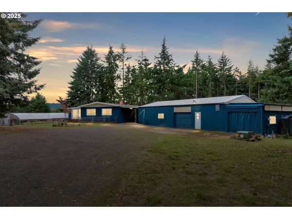 a view of house with outdoor space