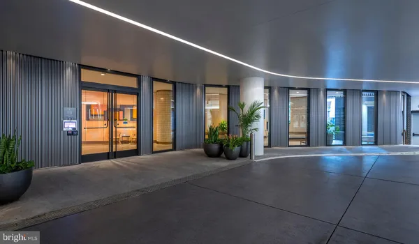 a outdoor space with patio furniture and potted plants
