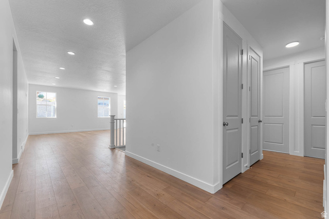 1024 South Tanner Road Santaquin, UT 84655 - Photo 4 of 20 Corridor with light wood-type flooring and recessed lighting