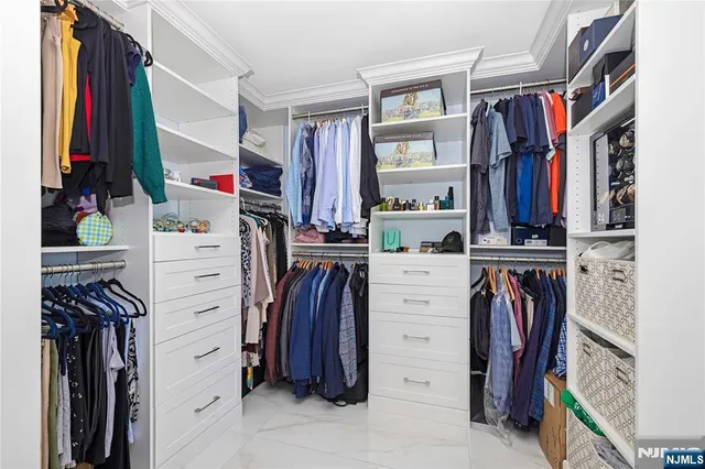 a room with books and knick knacks on it