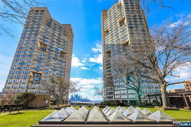 a city street lined with tall buildings