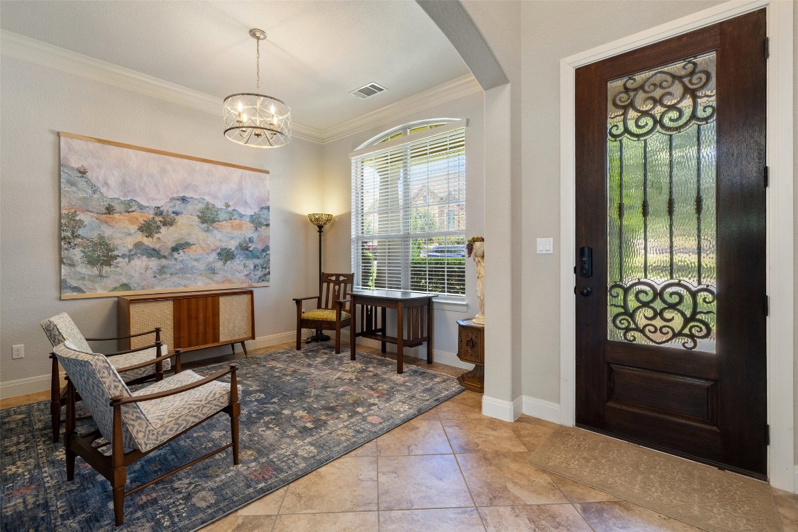 8709 Fescue Lane Austin, TX 78738 - Photo 5 of 36 a living room with furniture and a window