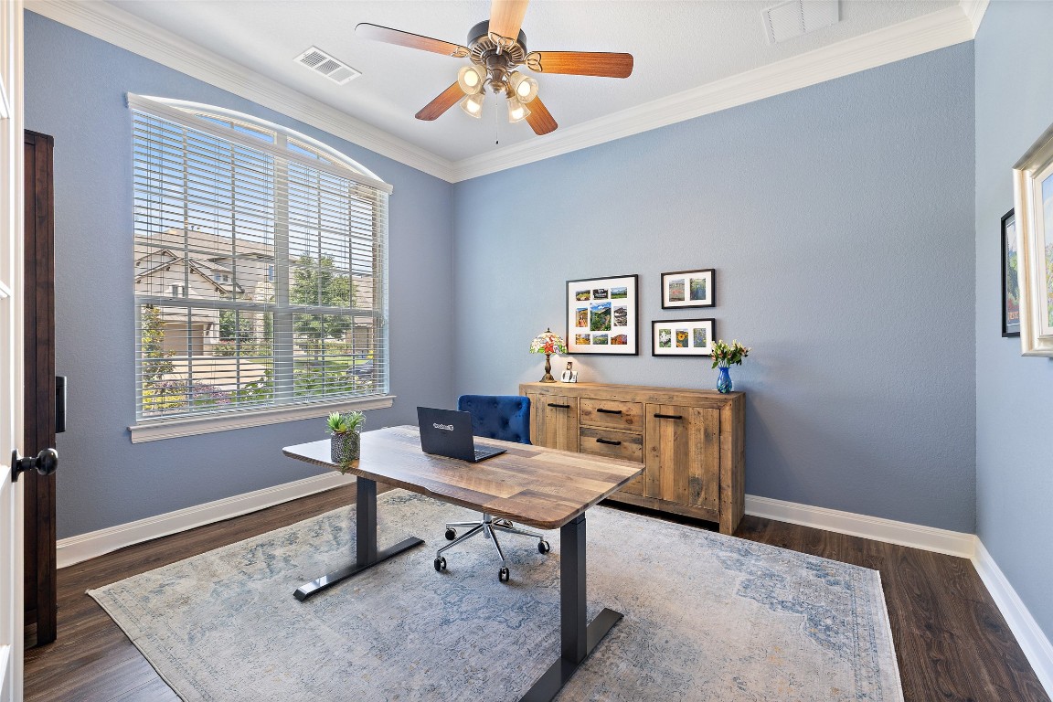 8709 Fescue Lane Austin, TX 78738 - Photo 7 of 36 a living room with furniture and a window