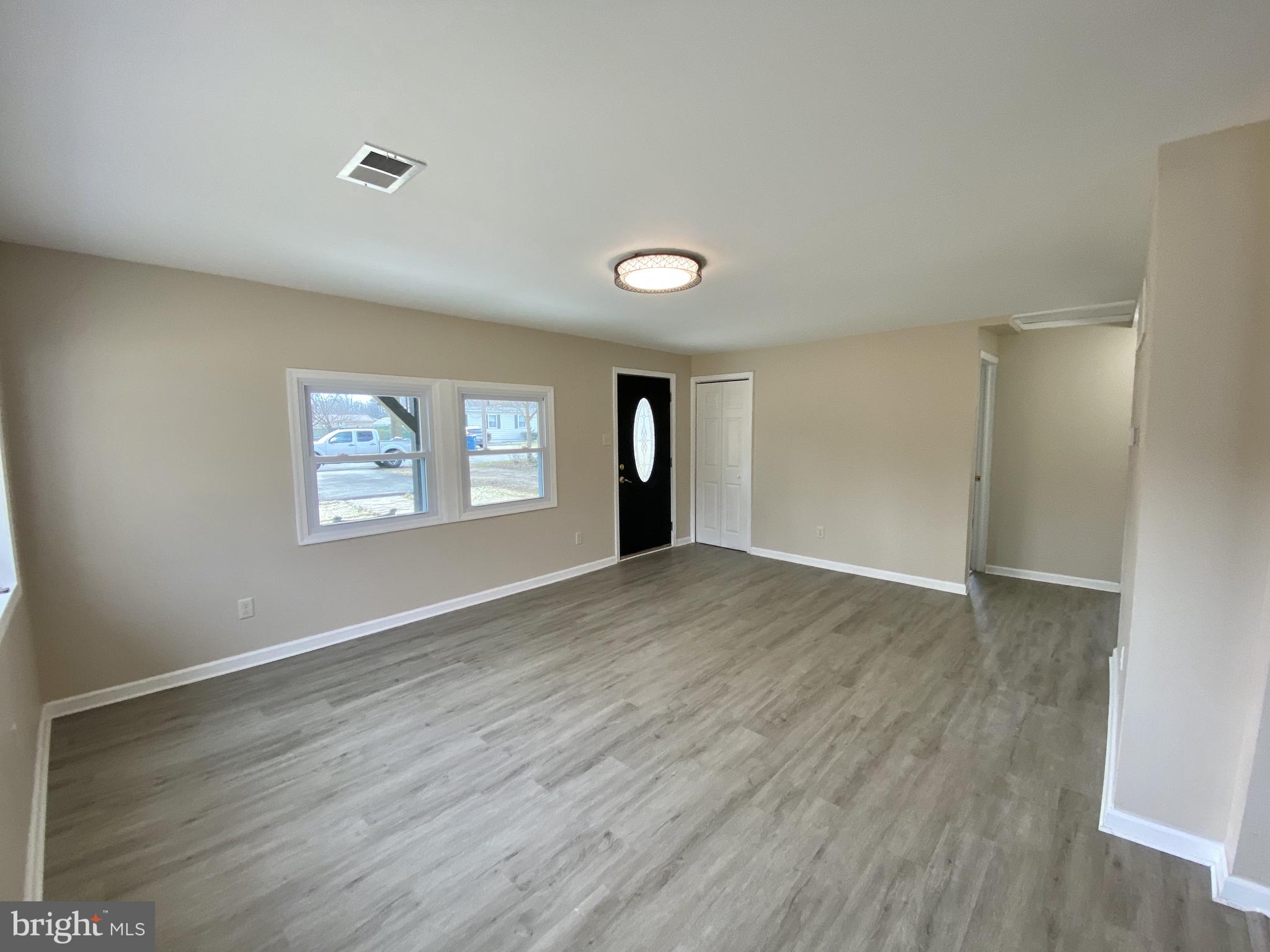 28 1/2 Mowery Road New Castle, DE 19720 - Photo 4 of 31 Beautiful Laminate Floors