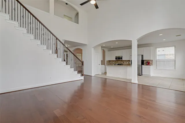 a view of an entryway with wooden floor