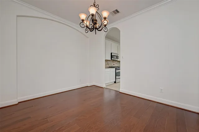 a view of a chandelier in a room