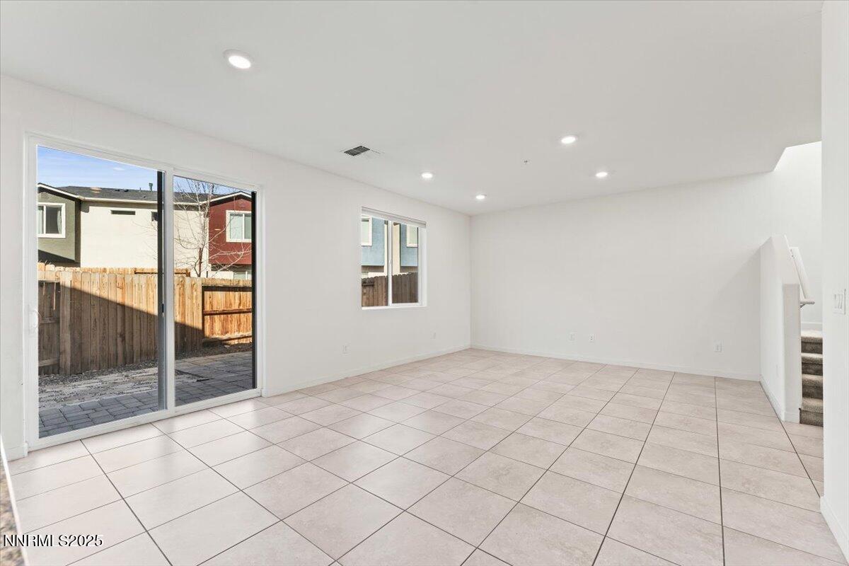 1048 Big Rock Loop Sun Valley, NV 89433 - Photo 12 of 25 a view of an empty room and window