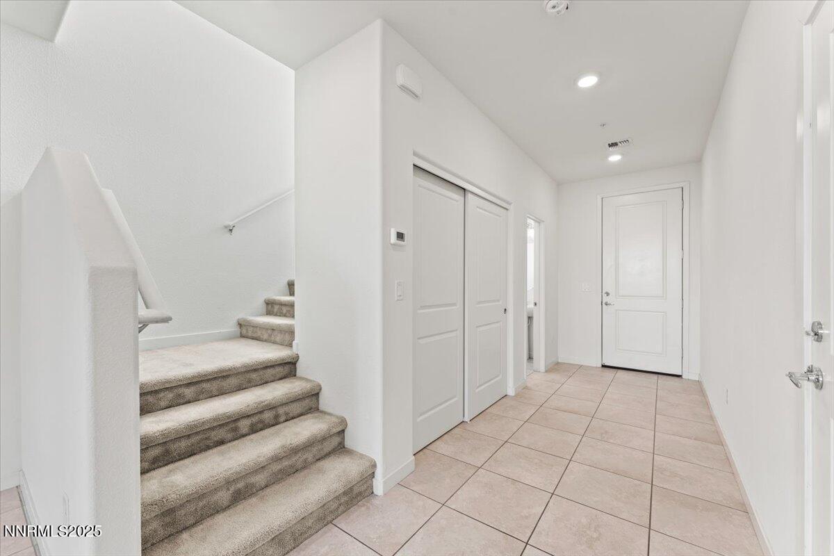 1048 Big Rock Loop Sun Valley, NV 89433 - Photo 10 of 25 a view of an entryway with staircase
