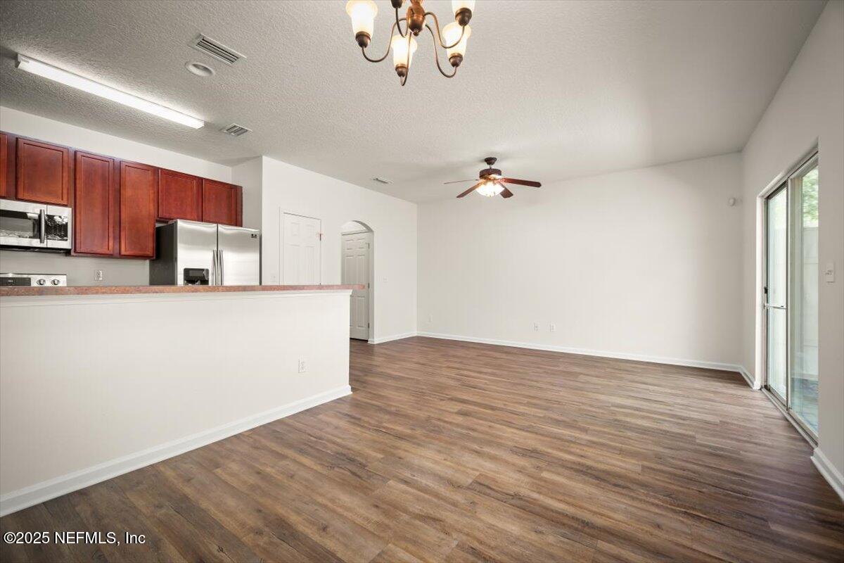 5260 Collins Road, Unit 1301 Jacksonville, FL 32244 - Photo 13 of 33 Dining to Living room