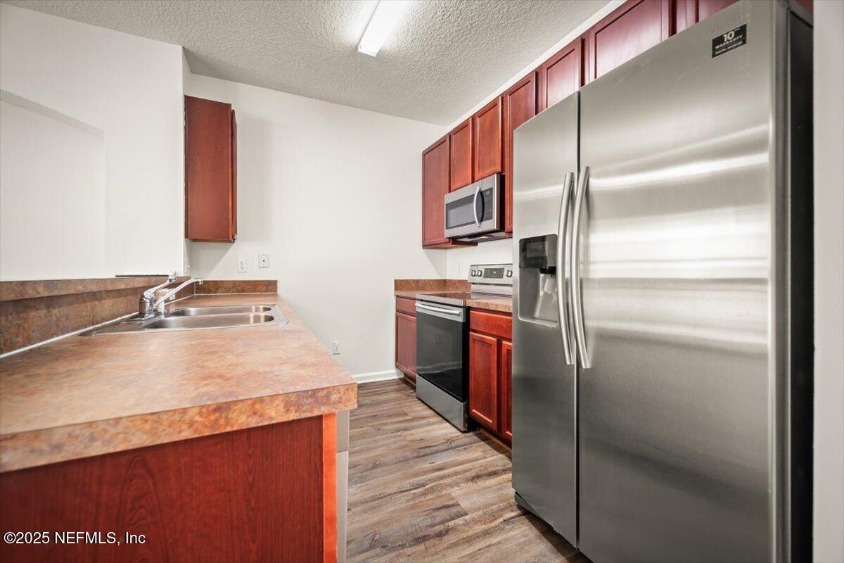 5260 Collins Road, Unit 1301 Jacksonville, FL 32244 - Photo 14 of 33 Kitchen