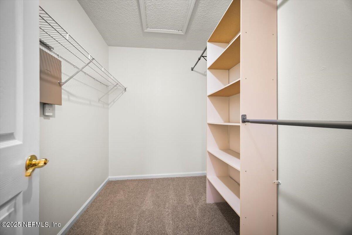 5260 Collins Road, Unit 1301 Jacksonville, FL 32244 - Photo 29 of 33 Master closet