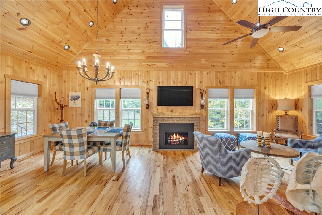 201 Eagles Nest Trail West Jefferson, NC 28694 - Photo 1 of 43 a living room with furniture wooden floor and a fireplace