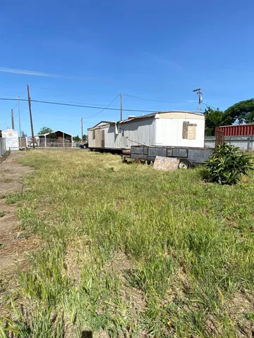 a view of a terrace with yard