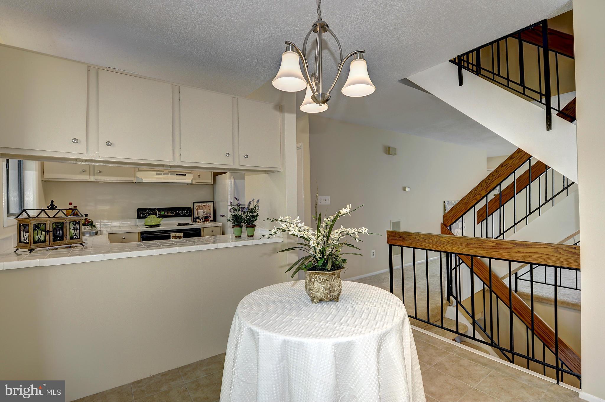 2196 Cartwright Place Reston, VA 20191 - Photo 8 of 30 Dining Room, Kitchen, stairway
