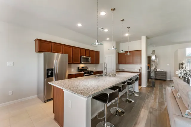 a kitchen with counter space cabinets and appliances