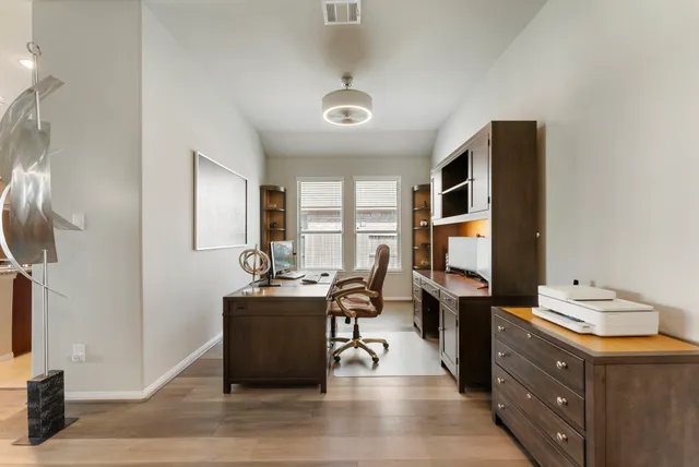 a room with furniture and a flat screen tv
