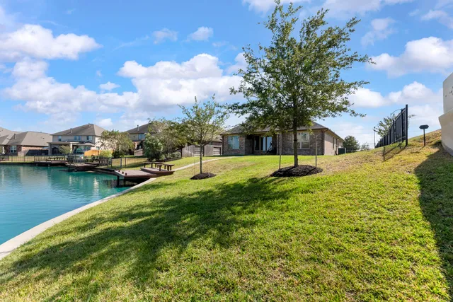 a view of a lake with a house