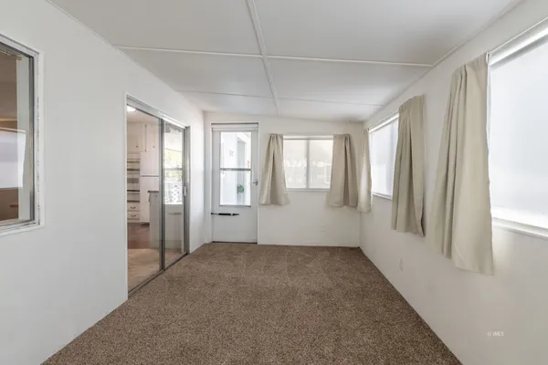 a view of storage and utility room with washer and dryer