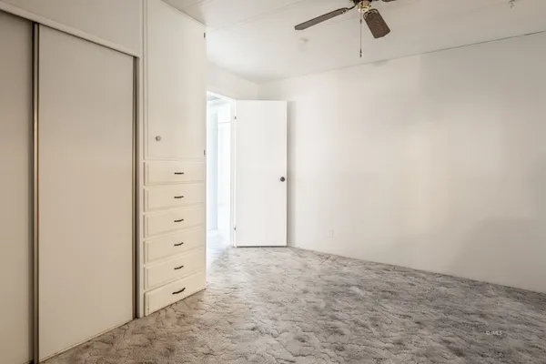 a view of a livingroom with a flat screen tv