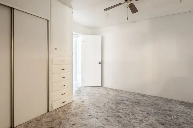 an empty room with closet