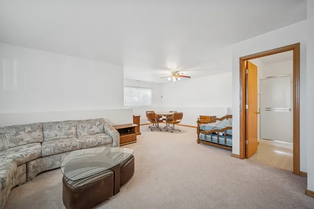 a living room with furniture and a couch