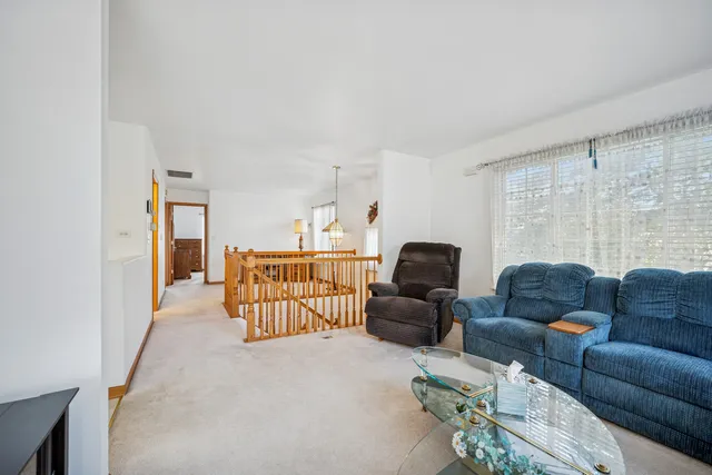a living room with furniture and a couch