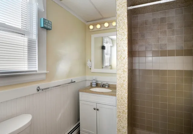 a kitchen with stainless steel appliances granite countertop a stove and a refrigerator