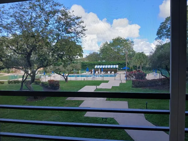 a view of outdoor space and yard