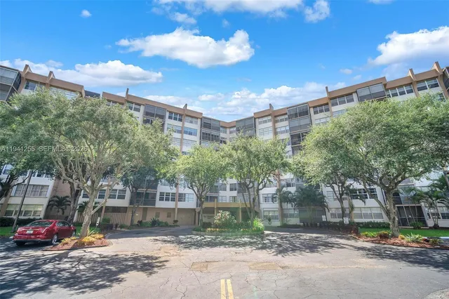 a view of street along with trees