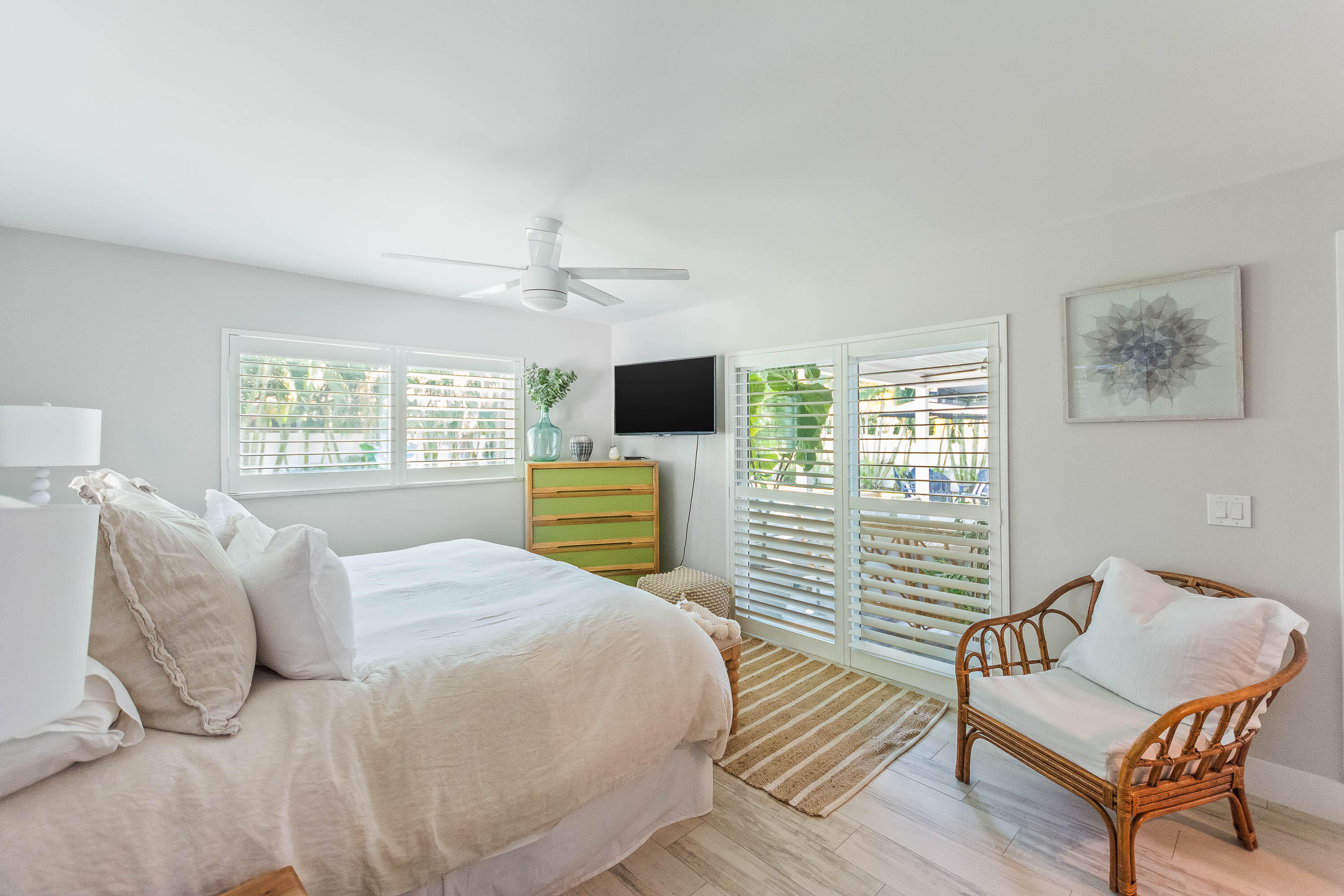 2830 Southwest 5th Street Boynton Beach, FL 33435 - Photo 16 of 26 a bedroom with a bed and a tv