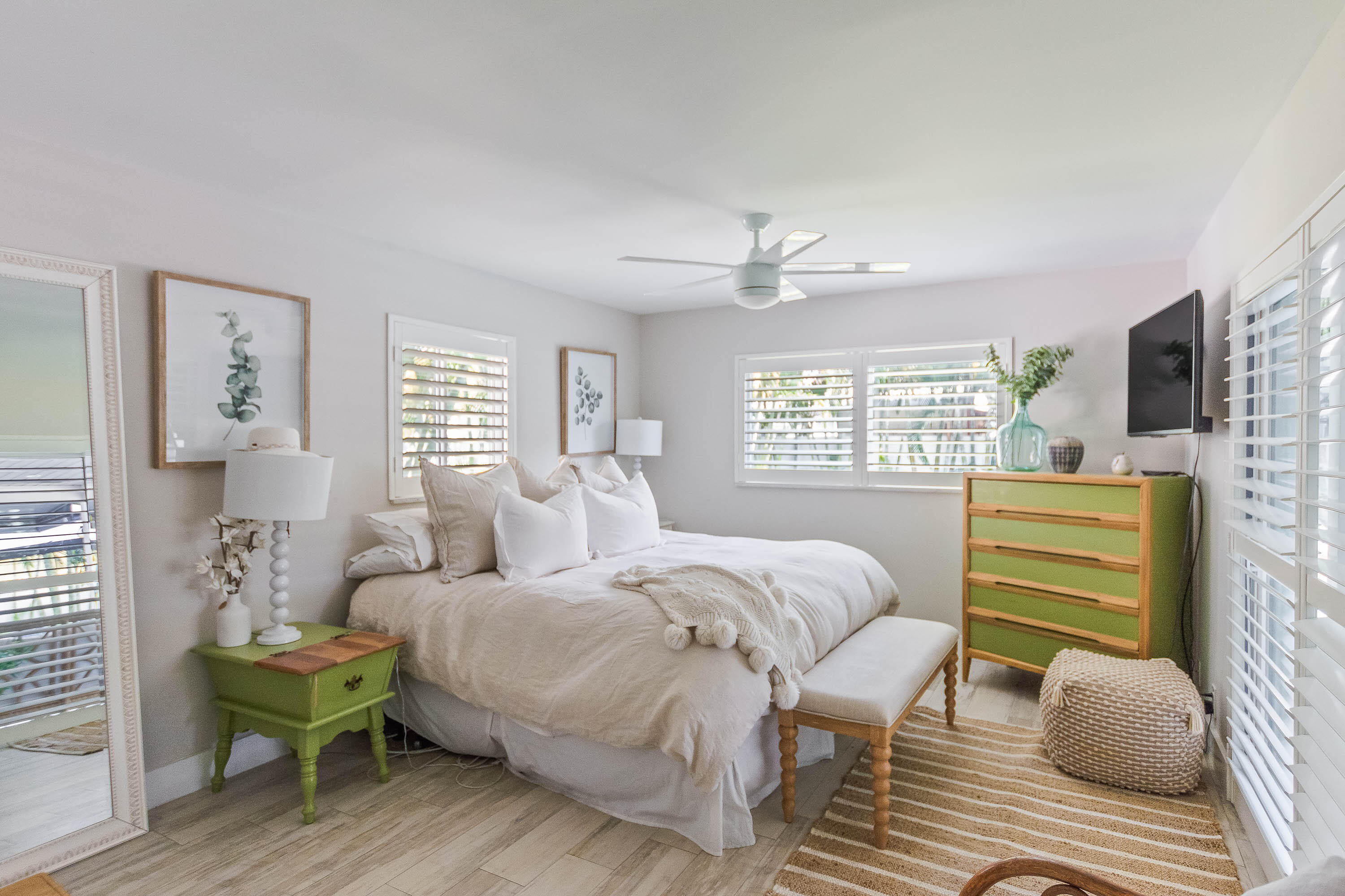 2830 Southwest 5th Street Boynton Beach, FL 33435 - Photo 7 of 26 a bedroom with a bed wooden floor and window