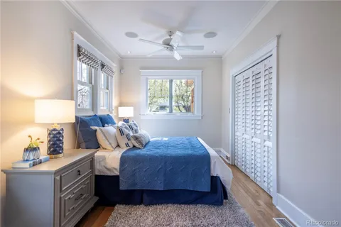 a bed room with a bed and a couch