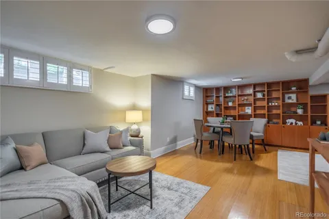 a workspace with furniture and window