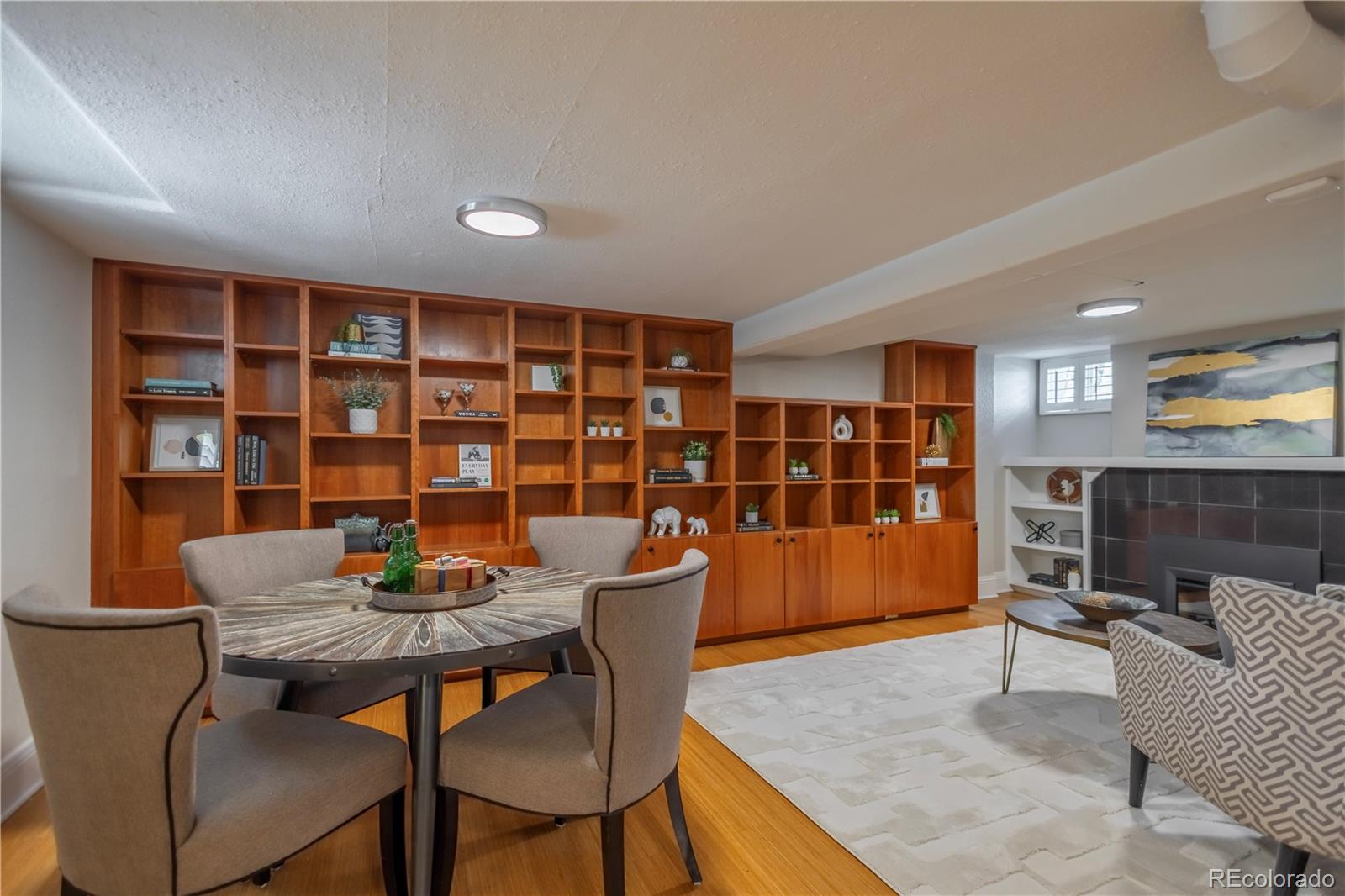 926 Steele Street Denver, CO 80206 - Photo 27 of 41 a workspace with furniture and window