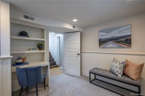 a view of livingroom with furniture and window