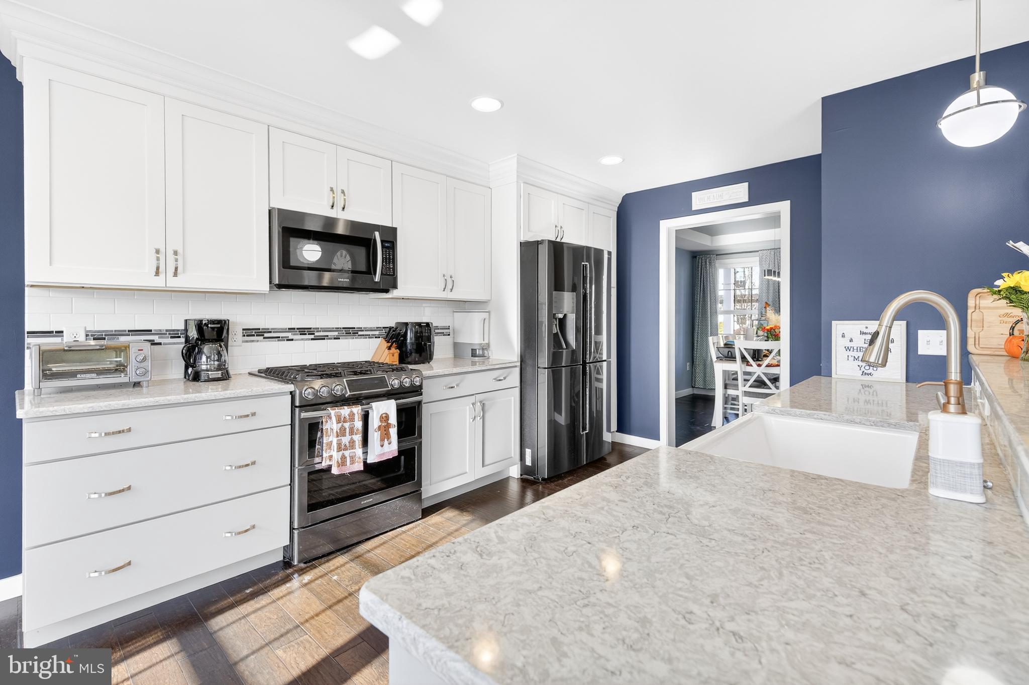 32 Katherines Way Lancaster, PA 17602 - Photo 14 of 42 a kitchen with stainless steel appliances a refrigerator sink and cabinets