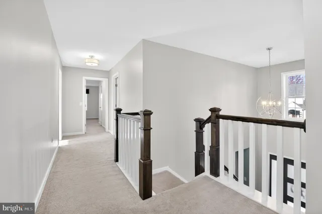 a view of a hallway with closet