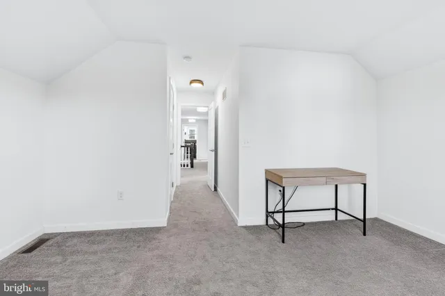 a view of a livingroom with a bench