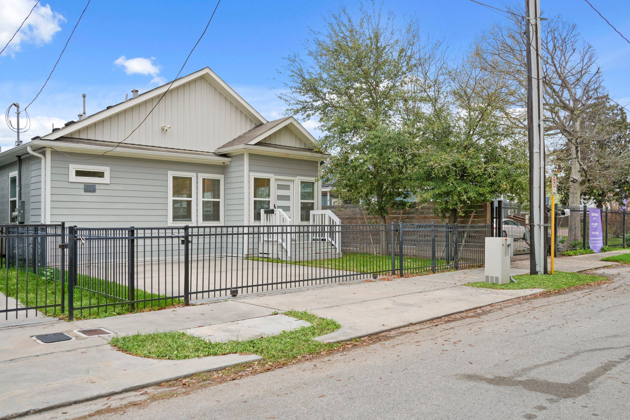 507 Carl Street Houston, TX 77009 - Photo 2 of 25 a house that has a tree in front of it