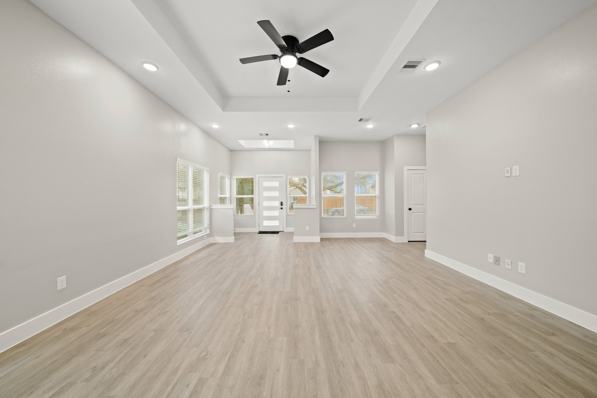 507 Carl Street Houston, TX 77009 - Photo 7 of 25 a view of a kitchen with a sink and wooden floor