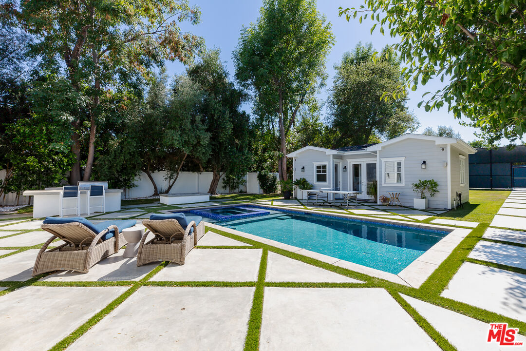 17524 Jayden Lane Encino, CA 91316 - Photo 40 of 52 a view of swimming pool with chairs