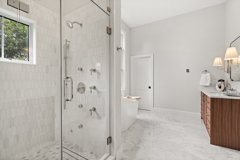 22 Priscilla Circle Wellesley, MA 02481 - Photo 27 of 38 a bathroom with a double vanity sink toilet and shower