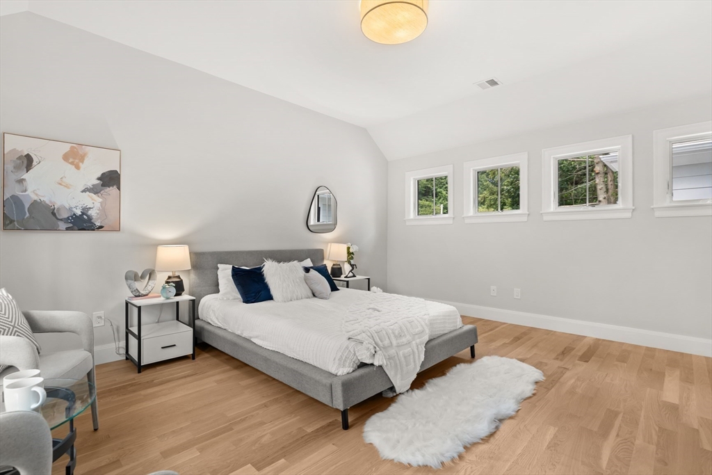22 Priscilla Circle Wellesley, MA 02481 - Photo 29 of 38 a bedroom with a bed and a couch