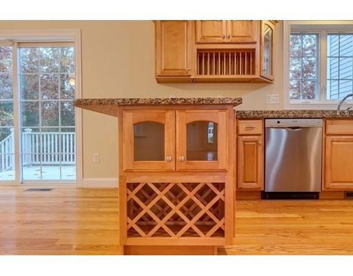 24 Regency Drive Dracut, MA 01826 - Photo 12 of 42 a black and white photo of a house