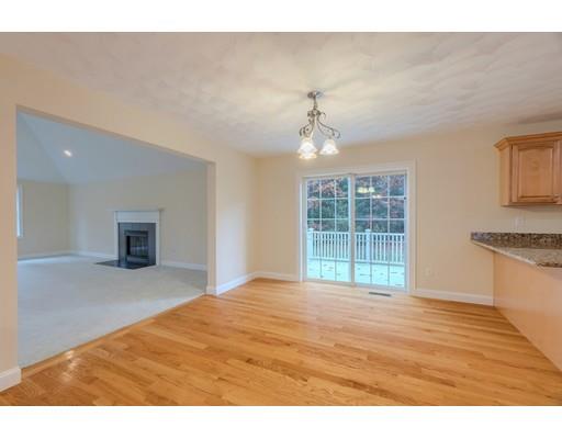 24 Regency Drive Dracut, MA 01826 - Photo 15 of 42 a view of an empty room with a window